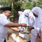 Pengajian BKMT, Bupati Dolly Di Sambut Warga Sibara-bara Dengan Di Upa-Upa
