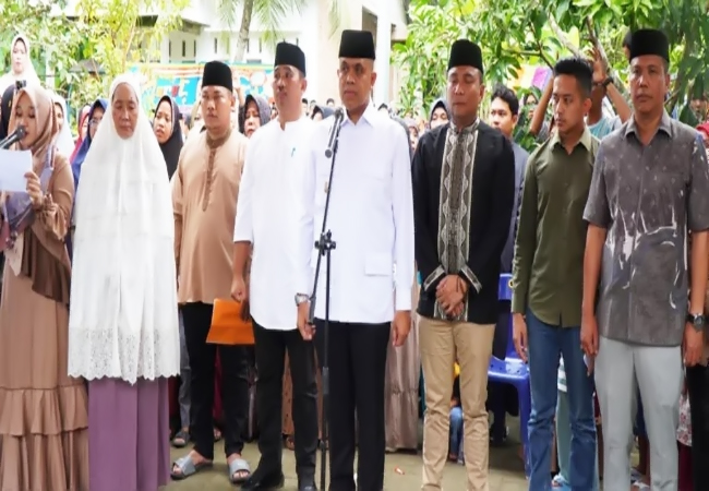 Pj Bupati Langkat Pimpin Upacara Pelepasan Jenazah Kades Serapuh ABC